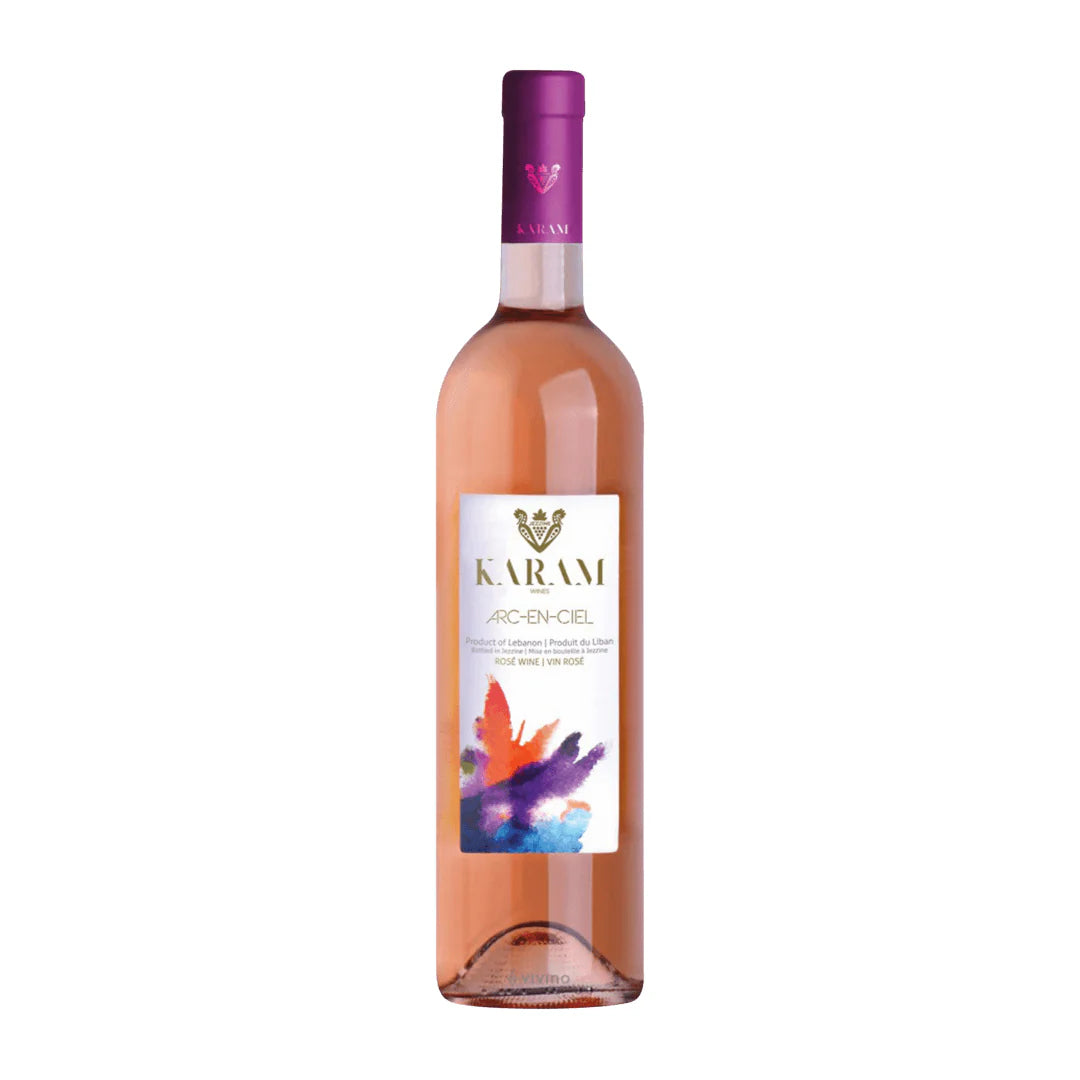 “A 750ml bottle of Karam Arc En Ciel Rosé wine with a sleek design, featuring a colorful rainbow-themed label; 13.5%.”
