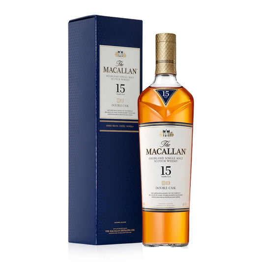 Bottle of Macallan 15 Year Old Double Cask Single Malt Scotch Whisky with box, showcasing premium packaging and golden amber color.